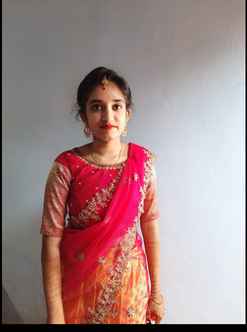 Young client in pink and orange lehenga